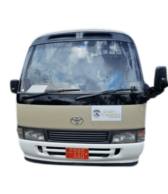 Toyota Coaster with Guia en Espanol branding