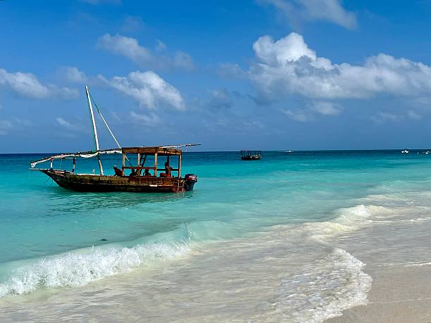 Traditional dhow boat on turquoise waters